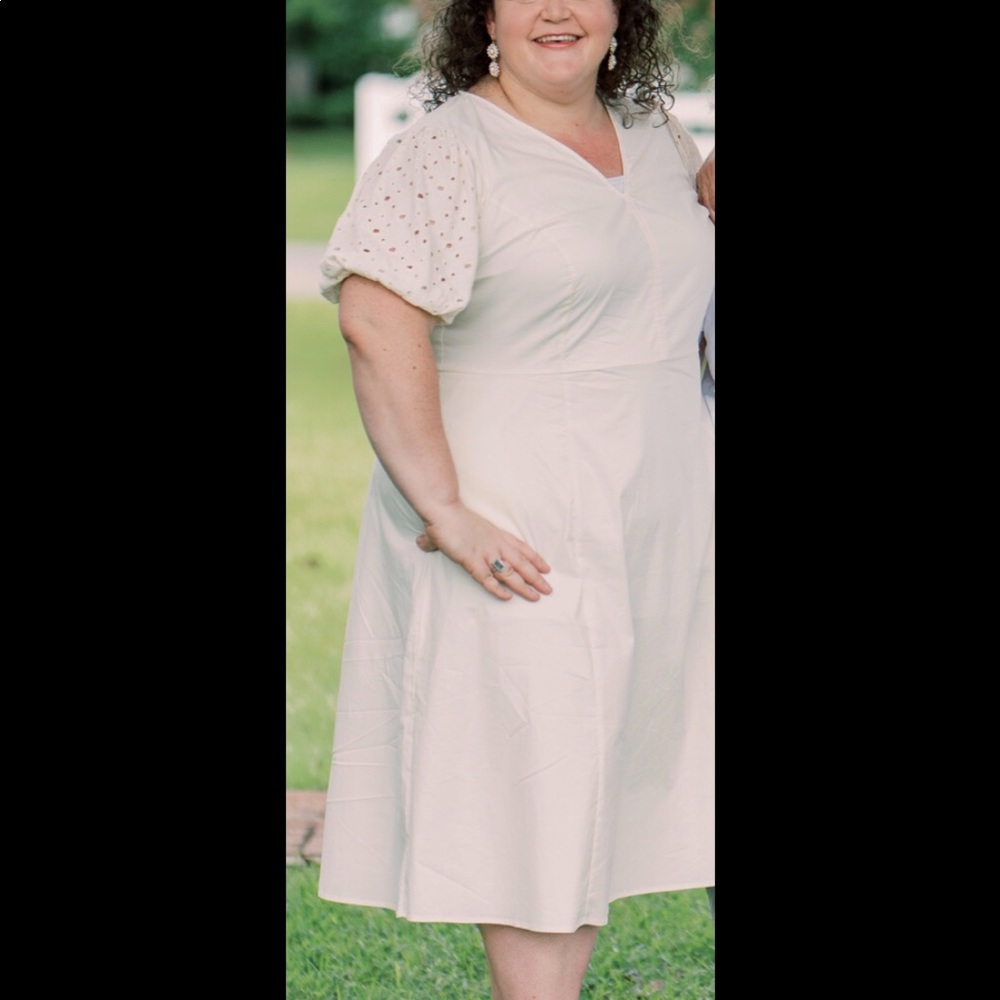 Ivory short sleeve eyelet dress.